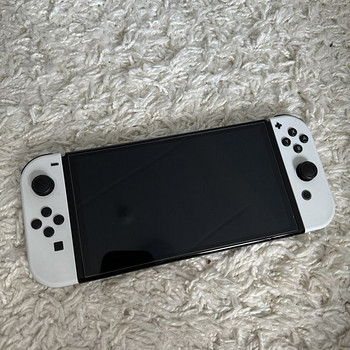 Nintendo Switch Oled + 60 games