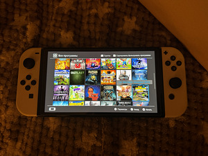 Nintendo Switch Oled + 60 игр (7 фото из 10)