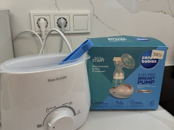 Canpol молокоотсос + стерилизатор + Philips Avent прокладки для груди