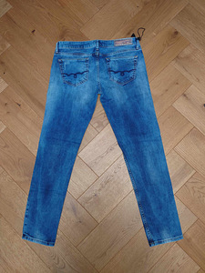 Новые джинсы MET размер 30. (3 фото из 3)