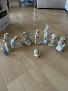 Фарфоровые статуэтки (7 фото из 9)