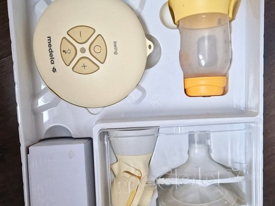 Молокоотсос Medela Swing Flex, электрический.