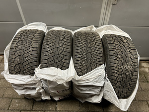 Шипованные шины Continental IceContact 2 275/40R21 T-XL (1 фото из 8)