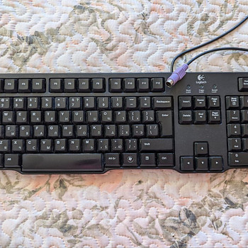 Клавиатура Logitech K100