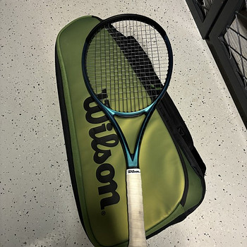 Tennisereket koos kotiga