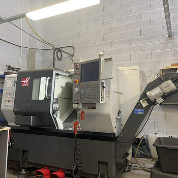 HAAS ST-10 + bar feeder Haas servo bar 300