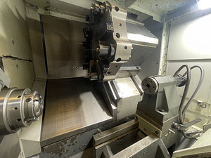 HAAS ST-10 + bar feeder Haas servo bar 300 (2 foto / 7)