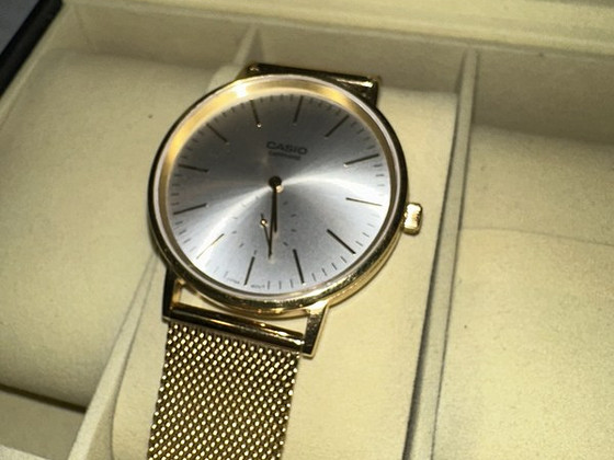 Часы Casio LTP-E140G-9AEF