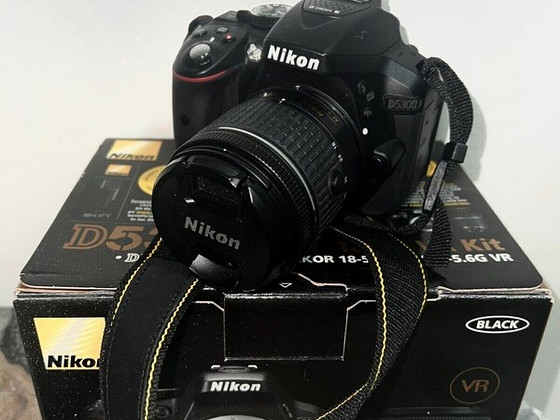 Nikon D5300 24.2MP Digital SLR Camera Body with box .