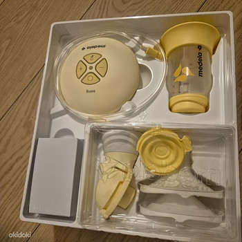 Молокоотсос Medela