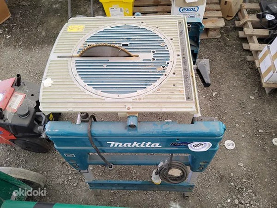 Поворотная пила Makita
