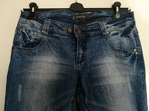 Женские джинсы RESERVED (3 фото из 3)