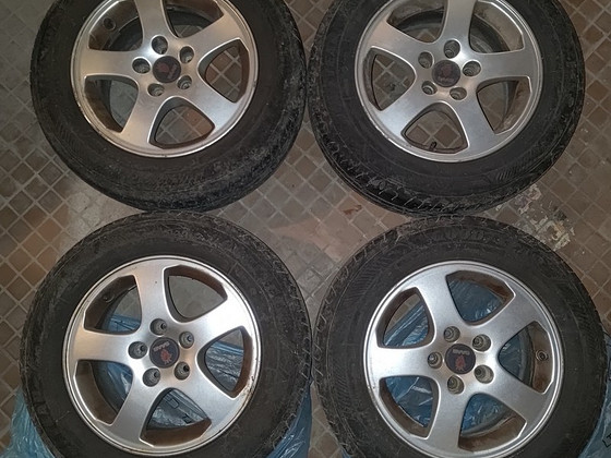 Saab 9-3 originaalveljed korralike Good Year suverehvidega