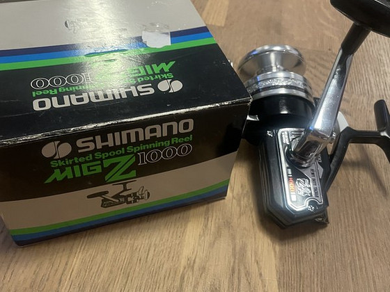 Катушка для спиннинга SHIMANO MIG Z 1000 НОВАЯ