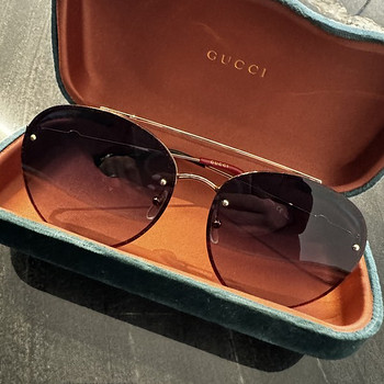 Солнцезащитные очки Gucci