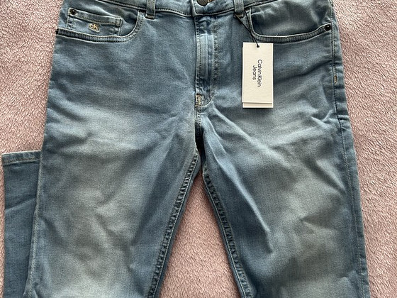 Новые джинсы Calvin Klein, размер 170