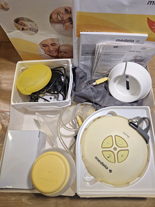 Medela Swing 2-фазный электрический молокоотсос и аксессуары (2 фото из 3)
