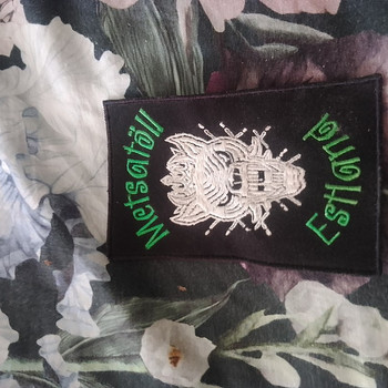 Metsatöll embleem