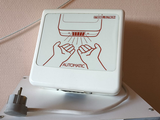 Elektriline automaatne kätekuivati