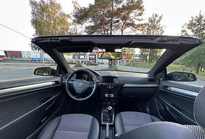 Opel Astra TwinTop 1.8 103kW (15 фото из 15)