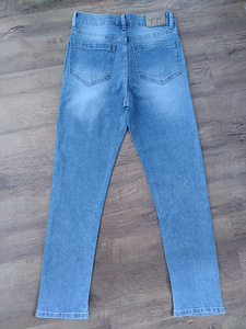 Новые джинсы р. S/M (2 фото из 3)