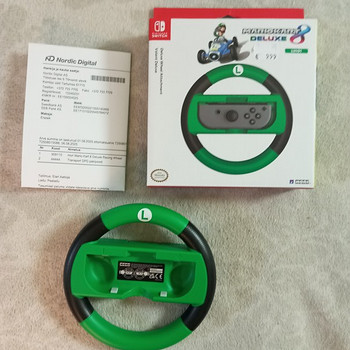 Nintendo Switch с рулем Mariokart
