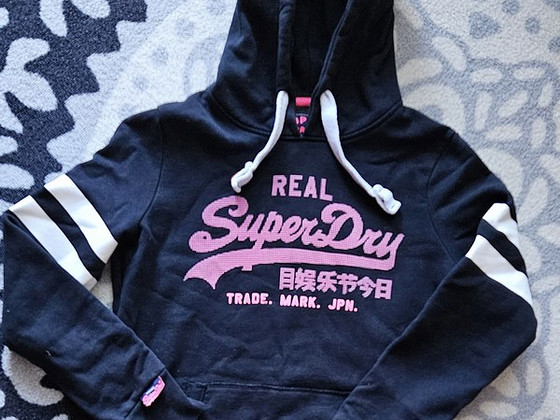 SuperDry pusa, M.