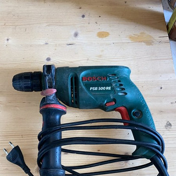 Электрическая ударная дрель Bosch PSB 500 RE.