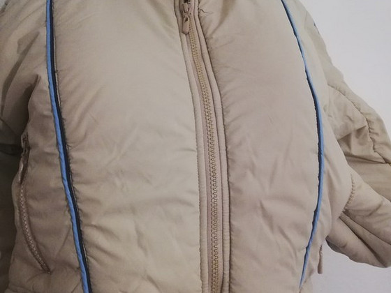 Uus lühike soojustatud jope, kirjas suurus XL