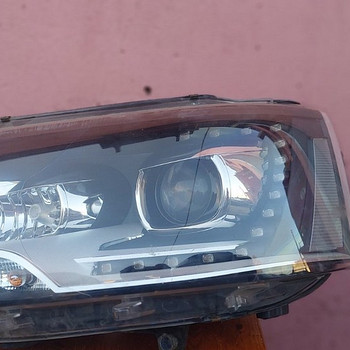 VW Multivan, Transporter левая передняя фара