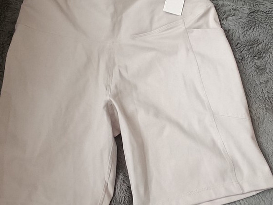 Calvin Klein biker retuusid väikese taskuga M.