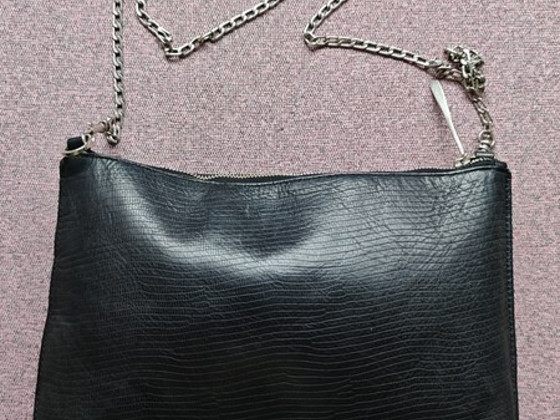 Jigsaw leather clutch