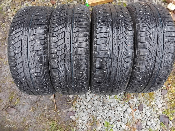 Шипованные шины R16/55/215 Continental