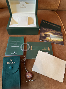 ROLEX Submariner (2 foto / 10)