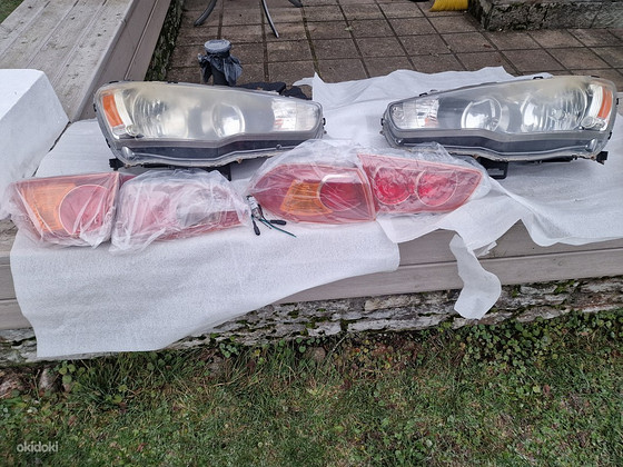 Tagatuled MITSUBISHI LANCER vasak ja parem