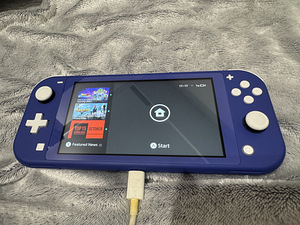 Nintendo switch lite (2 foto / 2)