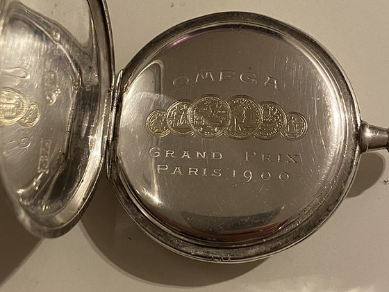 Серебряные карманные часы Omega