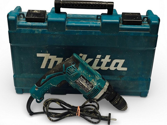 Дрелль Makita HP1631 + ящик