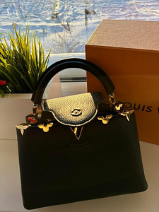 Stiiliikoon — Louis Vuitton Capucines BB (Must) (2 foto / 2)