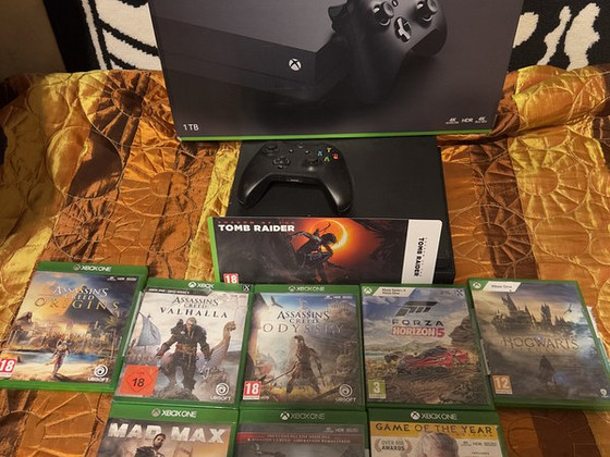 Xbox one x 1tb 4k +9 games