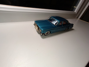 Mudel 1:25 Tin Friction PLYMOUTH VALIANT 1961 8 1/4" pikk B (1 foto / 9)