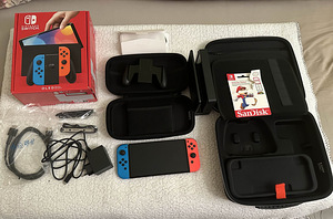 Nintendo Switch OLED (почти новый) полный комплект (1 фото из 6)