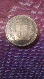 Монета (3 фото из 3)