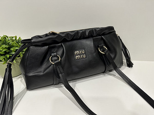 MiuMiu kotid (1 foto / 5)