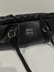 MiuMiu kotid (2 foto / 5)