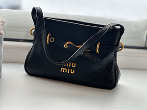 MiuMiu kotid (5 foto / 5)