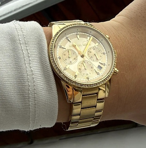 Michael Kors kuldne käekell (3 foto / 3)