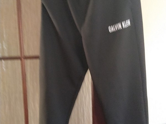 Calvin Klein püksid + HH tuulejope suurus S
