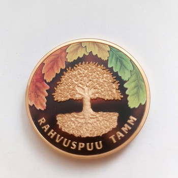 Tammele pühendatud kullatud medal