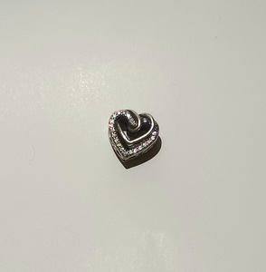 Pandora Amulett "Sädelevad põimunud südamed" (5 foto / 5)
